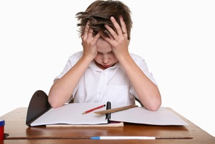 Boy frustrated with school work